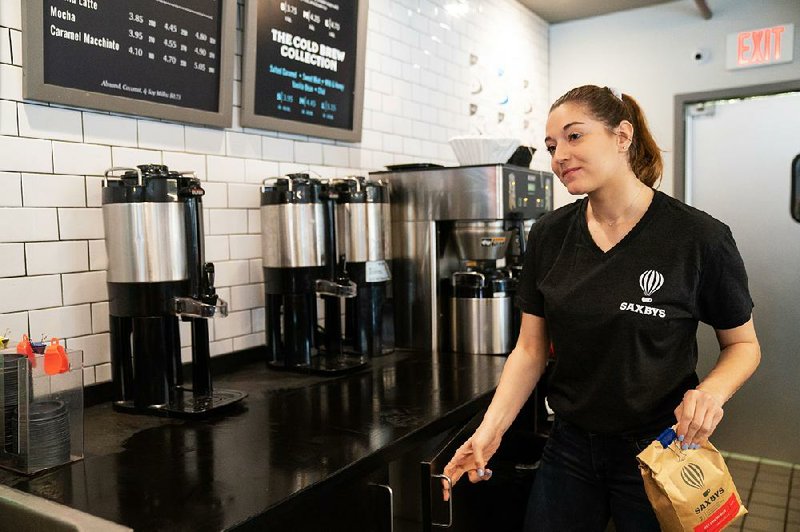 Alyssa Bennett, student cafe executive officer, works at Saxbys cafe in West Philadelphia late last month. 