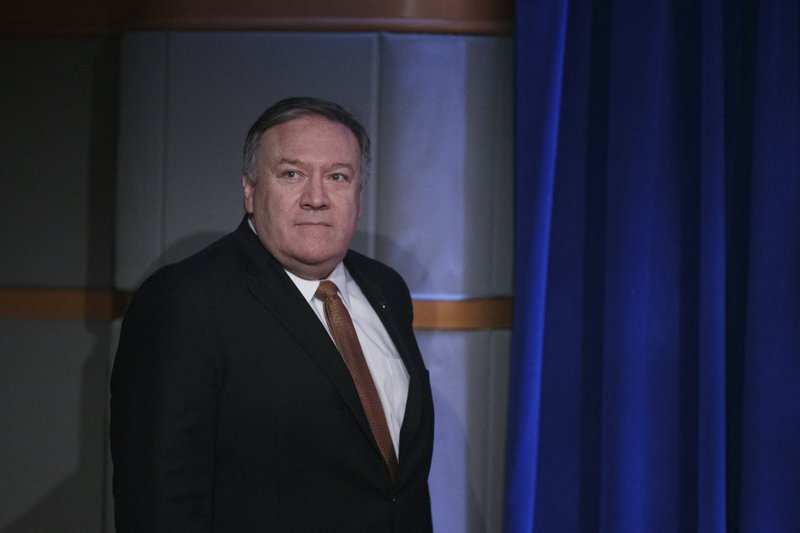 Secretary of State Mike Pompeo arrives for a news conference at the State Department, in Washington, Friday, March 15, 2019. (AP Photo/Carolyn Kaster)