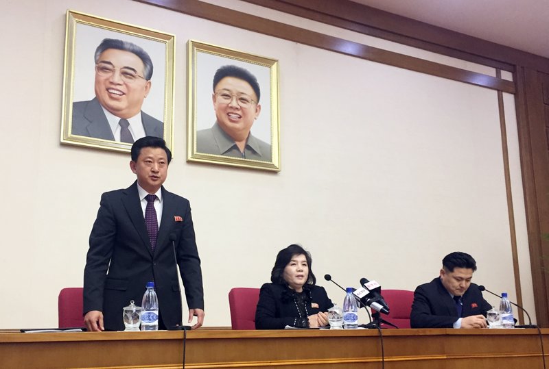 CORRECTS YEAR - North Korean Vice Foreign Minister Choe Son Hui, center, speaks at a gathering for diplomats in Pyongyang, North Korea on Friday, March 15, 2019. North Korean leader Kim Jong Un will soon make a decision on whether to continue diplomatic talks and maintain the country's moratorium on missile launches and nuclear tests, the senior North Korean official said, noting the U.S. threw away a golden opportunity at the recent summit between their leaders. Interpreter is on Choe's right and the man standing is unidentified vice director of foreign ministry&#x2019;s North America desk. (AP Photo/Eric Talmadge)