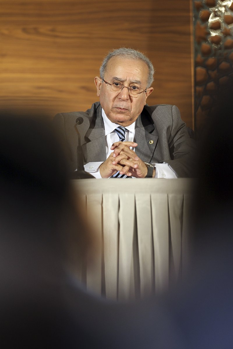 Algeria's Vice Prime Minister Ramtane Lamamra gives a press conference, in Algiers, Algeria, Thursday, March 14, 2019. Algeria's new prime minister is promising to create a government within days as the country faces mass protests calling on President Abdelaziz Bouteflika to step down. (AP Photo/Anis Belghoul)