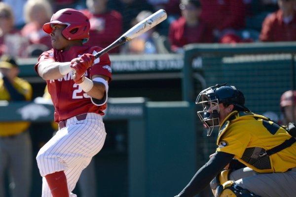 Arkansas left fielder Christian Franklin connects for a 2-run single against Missouri Saturday, March 16, 2019, during the fourth inning at Baum-Walker Stadium in Fayetteville. Visit nwadg.com/photos to see more photographs from the game.