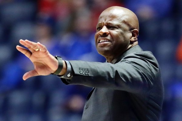 Arkansas head coach Mike Anderson yells to his players in the first half of an NCAA college basketball game against Florida at the Southeastern Conference tournament Thursday, March 14, 2019, in Nashville, Tenn. (AP Photo/Mark Humphrey)