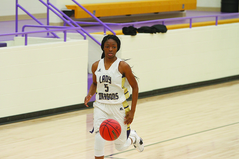 Junction City's Taykeetria Rogers dribbles the ball down the court in action this season. The 5-7 senior was named News-Times/Sports Alley Girls Basketball Player of the Year.