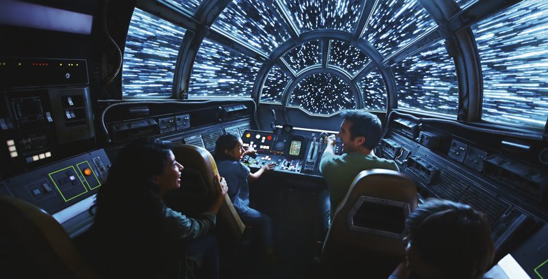 This rendering released by Disney and Lucasfilm shows people on the planned Inside Millennium Falcon: Smugglers Run attraction, part of Star Wars: Galaxy's Edge a 14-acre area set to open this summer at the Disneyland Resort in Anaheim, California, then in the fall at Disney's Hollywood Studios in Orlando, Florida. Disney Parks/Lucasfilm photo via AP