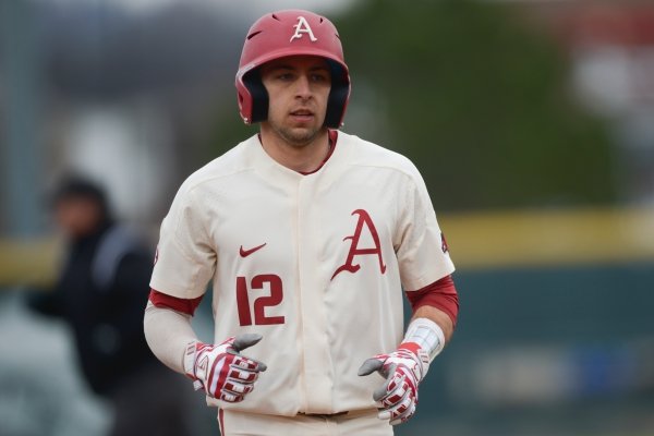 NWA Democrat-Gazette/CHARLIE KAIJO Arkansas Razorbacks catcher Casey Opitz (12) runs to third during a baseball game, Sunday, March 10, 2019 at Baum Stadium in Fayetteville.