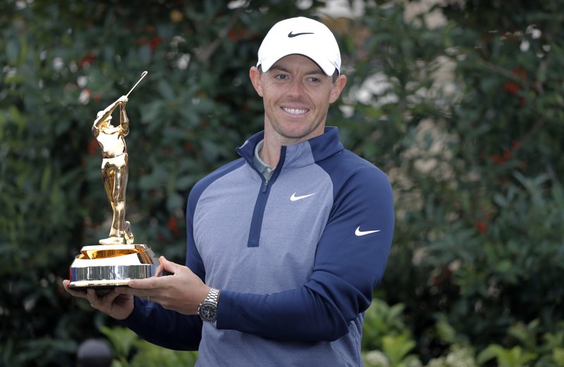 The Associated Press MCILROY WINS: Rory McIlroy, of Northern Ireland, holds the trophy after winning The Players Championship golf tournament Sunday, in Ponte Vedra Beach, Fla.