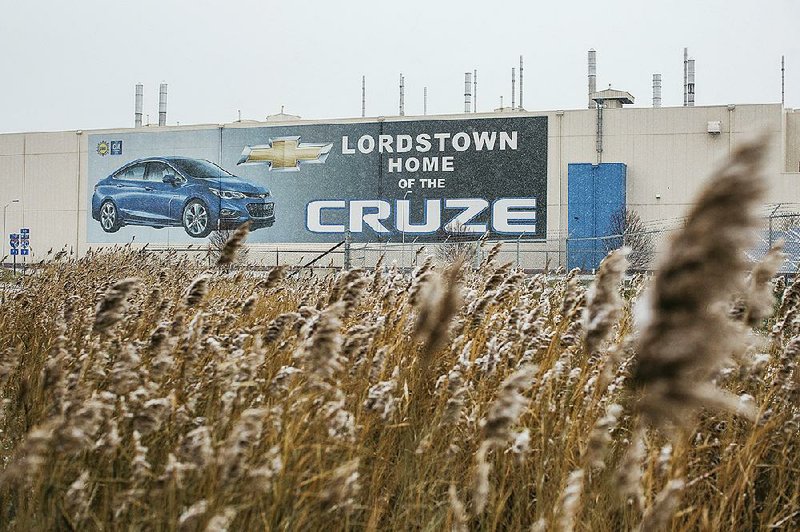 A banner depicting the Chevrolet Cruze model vehicle is displayed at the General Motors plant in Lordstown, Ohio, in November. GM closed the plant earlier this month.
