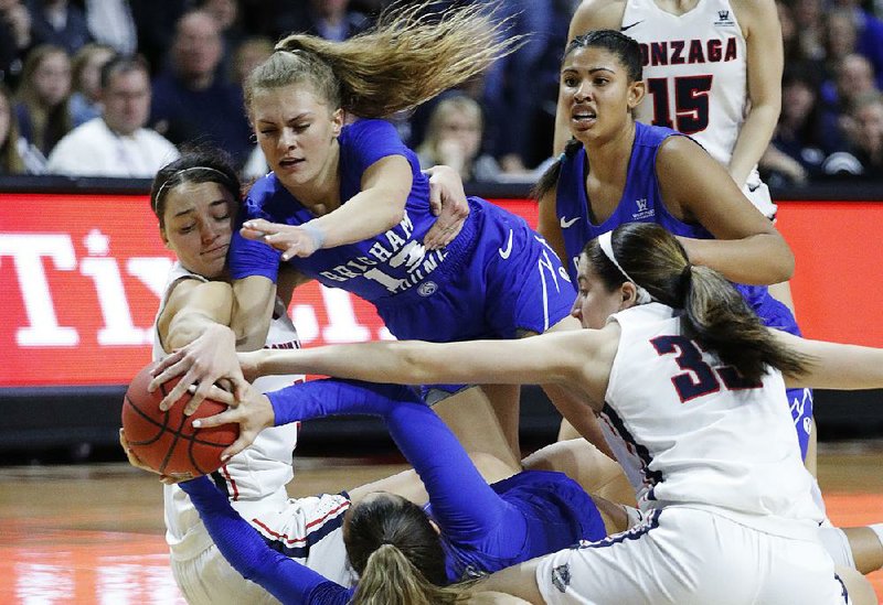 Gonzaga’s Jenn Wirth (left) averages 8.4 points and 5.3 rebounds per game for the Bulldogs, who meet UALR on Saturday in the first round of the NCAA Women’s Tournament. 