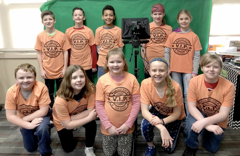 SUBMITTED Kash May (front, left), Svea Stauffacher, Kyla Yust, Piper Batie, Ezekiel Griffis, Brady Qualls (back, left), Cameron Bedwell, Holden Jeffries, Teagen Muldoon and Parker Pittman pose for a photo on Feb. 26 with the new equipment purchased through a Lowe's Toolbox for Education grant received by Gravette Upper Elementary School.