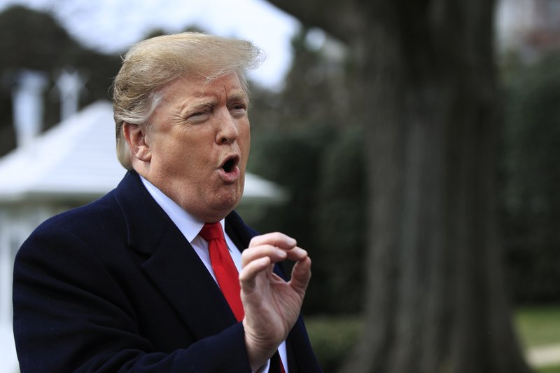 President Donald Trump speaks to reporters before leaving the White House in Washington, Wednesday, March 20, 2019, for a trip to visit a Army tank plant in Lima, Ohio, and a fundraising event in Canton, Ohio. Trump is escalating his increasingly awkward public fight with the spouse of a top aide. (AP Photo/Manuel Balce Ceneta)