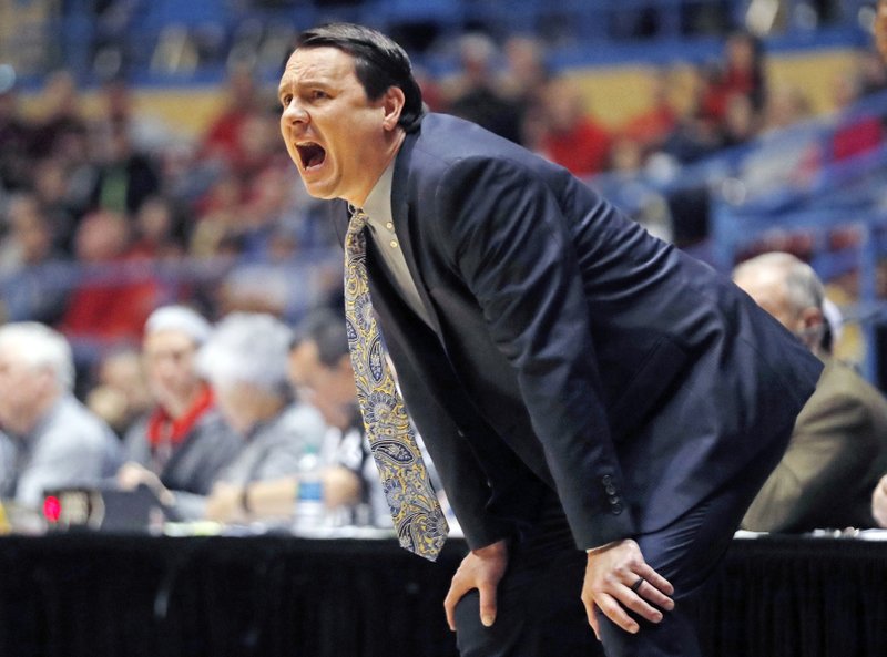 In this Dec. 15, 2018, file photo, Abilene Christian coach Joe Golding yells out at his players during the first half of an NCAA college basketball game against Texas Tech in Lubbock, Texas. (AP Photo/Brad Tollefson, File)