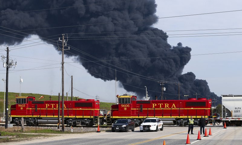 Firefighters continue to battle the petrochemical fire at Intercontinental Terminals Company, which grew in size due to a lack of water pressure last night Tuesday, March 19, 2019, in Deer Park, Texas. (Godofredo A. Vasquez/Houston Chronicle via AP)