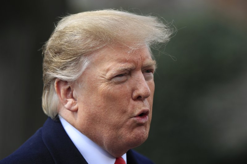 President Donald Trump speaks to reporters before leaving the White House in Washington, Wednesday, March 20, 2019, for a trip to visit a Army tank plant in Lima, Ohio, and a fundraising event in Canton, Ohio. (AP Photo/Manuel Balce Ceneta)
