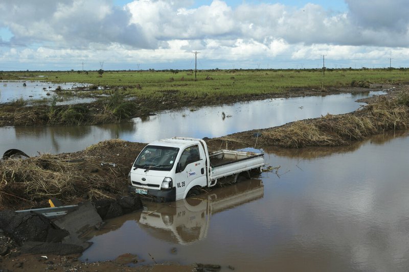 A vehicle is submerged in floodwater after it got swept away by Cyclone Idai in Nyamatanda about 50 kilometres from Beira, in Mozambique, Thursday March, 21, 2019. Some hundreds are dead, many more still missing and thousands at risk from massive flooding across the region including Mozambique, Malawi and Zimbabwe caused by Cyclone Idai.(AP Photo/Tsvangirayi Mukwazhi)