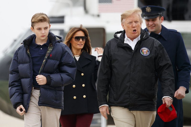  In this March 8, 2019 file photo, President Donald Trump and first lady Melania Trump and their son Barron Trump, walk from Marine One to board Air Force One, Friday, March 8, 2019, in Andrews Air Force Base, Md. 