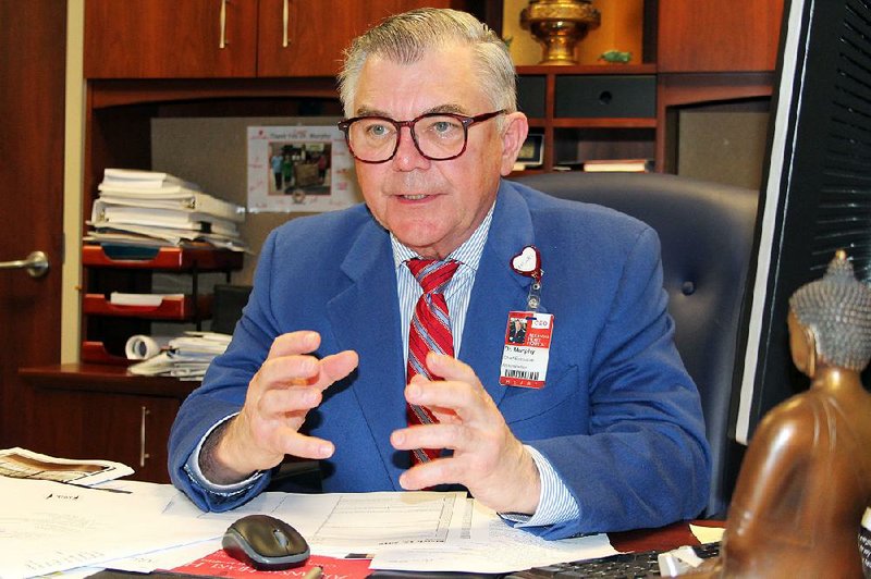 Dr. Bruce Murphy, chief executive officer of Arkansas Heart Hospital, is shown in his office at the hospital he helped start in 1997. He is being honored at the 16th Annual Taste of Little Rock. Proceeds from the event will benefit the University of Arkansas at Little Rock’s Alumni Association Scholarship Fund. 