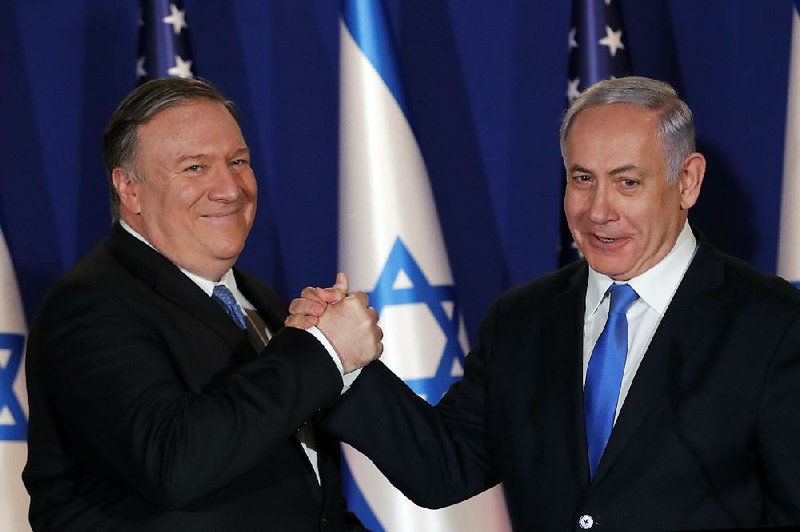 Secretary of State Mike Pompeo (left) and Israeli Prime Minister Benjamin Netanyahu pose Thursday during a visit to Netanyahu’s official residence in Jerusalem. 