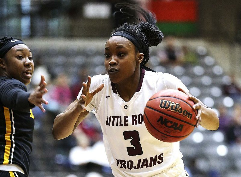 Terrion Moore (above) and Tori Lasker combined to contribute 19.8 points per game as UALR posted a 15-3 Sun Belt Conference record, but the Trojans needed time to weave them into games together. It wasn’t easy. “It was hard not playing, especially seeing my team — I don’t want to say struggle — but seeing them not getting help in places I could help. It was a little hard,” Moore said. 