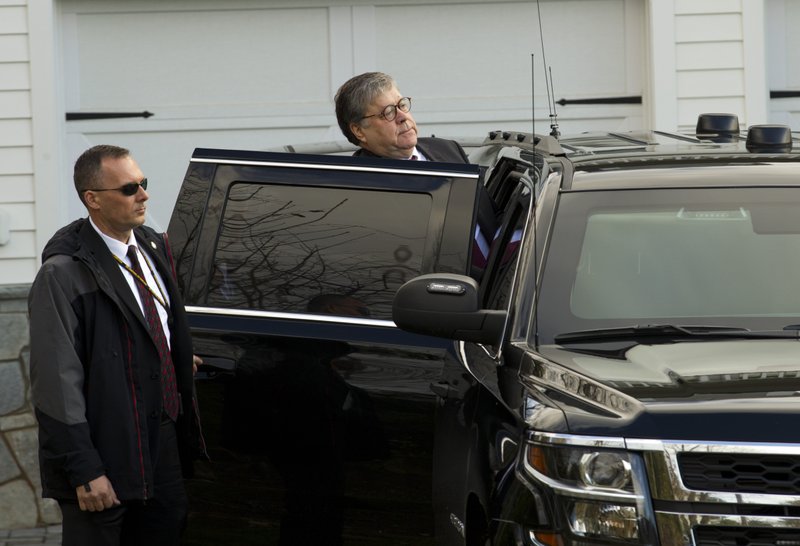 Attorney General William Barr leaves his home in McLean, Va., on Friday. Special Counsel Robert Mueller is expected to present a report to the Justice Department any day now outlining the findings of his nearly two-year investigation into Russian election meddling, possible collusion with Trump campaign officials and possible obstruction of justice by Trump . (AP Photo/Jose Luis Magana)