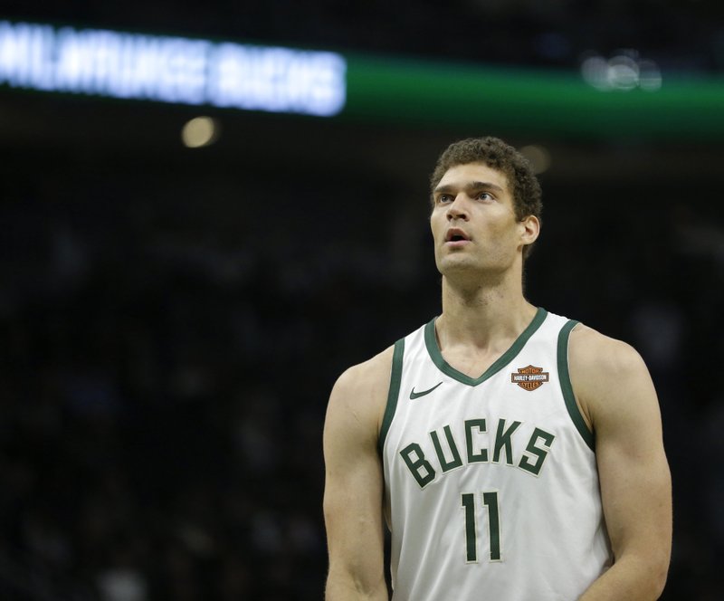 Milwaukee Bucks' Brook Lopez shoots a free throw during the second half of an NBA basketball game against the Charlotte Hornets Saturday, March 9, 2019, in Milwaukee. 