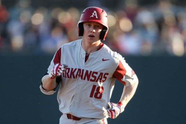 Arkansas' Heston Kjerstad (18) runs around the bases after hitting a solo home run against Alabama during an NCAA college baseball game in Tuscaloosa, Ala., Friday, March 22, 2019. (Gary Cosby Jr./The Tuscaloosa News via AP)