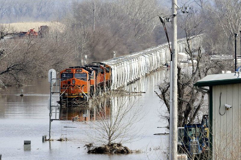 Many ethanol shipments from the Midwest have been halted by floodwaters blocking rail traffic, including this BNSF train stopped recently near Plattsmouth, Neb. 