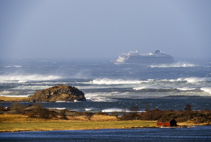 The cruise ship Viking Sky as it drifts after sending a Mayday signal because of engine failure in windy conditions near Hustadvika, off the west coast of Norway, Saturday March 23, 2019. The Viking Sky is forced to evacuate its estimated 1,300 passengers. (Odd Roar Lange / NTB scanpix via AP)