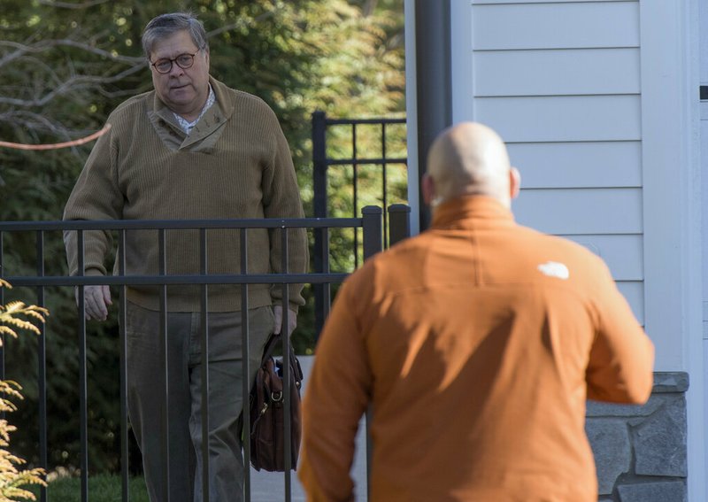 Attorney General William Barr leaves his home in McLean, Va., on Saturday morning, March 23, 2019. Special counsel Robert Mueller closed his long and contentious Russia investigation with no new charges, ending the probe that has cast a dark shadow over Donald Trump's presidency. (AP Photo/Sait Serkan Gurbuz)