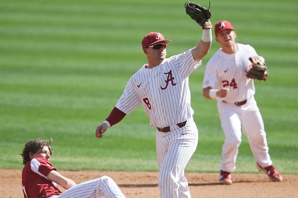 WholeHogSports - UA takes hits anyway it can