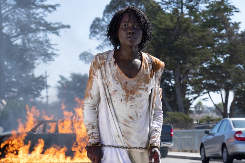 This image released by Universal Pictures shows Lupita Nyong'o in a scene from "Us," written, produced and directed by Jordan Peele. (Claudette Barius/Universal Pictures via AP)