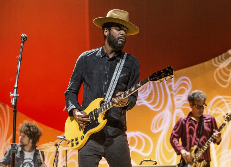 FILE - This Nov. 5, 2017 file photo shows Gary Clark Jr. performing at the Summit LA17 in Los Angeles. Clark confronts racism with his new album "This Land."  (Photo by Amy Harris/Invision/AP, File)