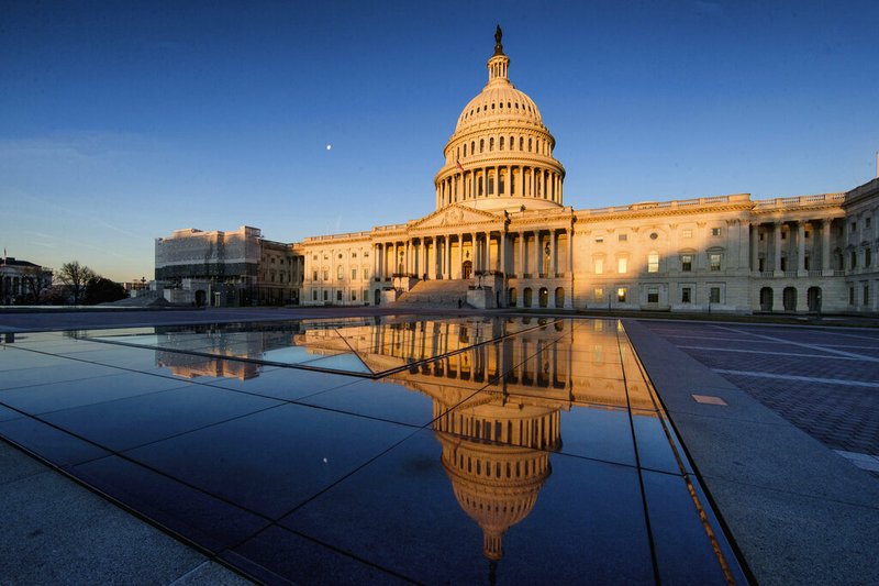 The U.S Capitol is seen at sunrise, Sunday, March 24, 2019, in Washington. The special counsel's report on how the Russians tried to influence the 2016 presidential election and any involvement with the Trump campaign is being boiled down to a summary of key findings. That summary is expected to be released to Congress and the public sometime Sunday. (AP Photo/Alex Brandon)