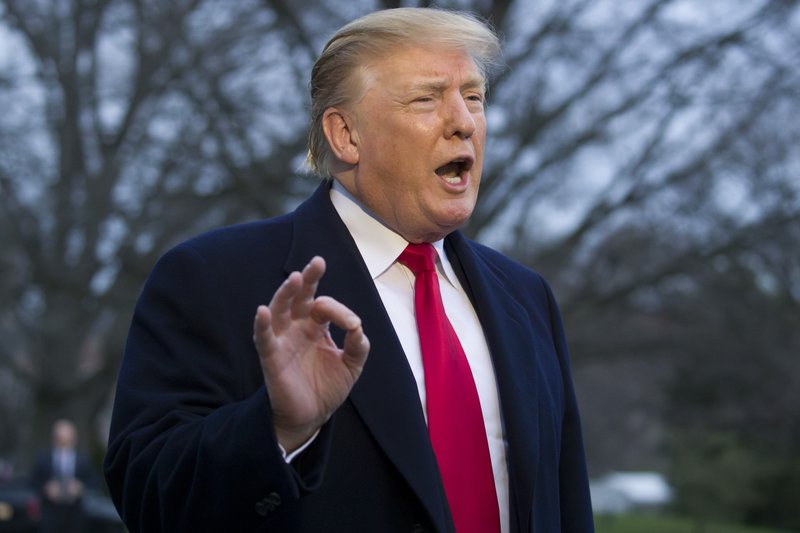 President Donald Trump speaks with the media after stepping off Marine One on the South Lawn of the White House, Sunday, March 24, 2019, in Washington. (AP Photo/Alex Brandon)