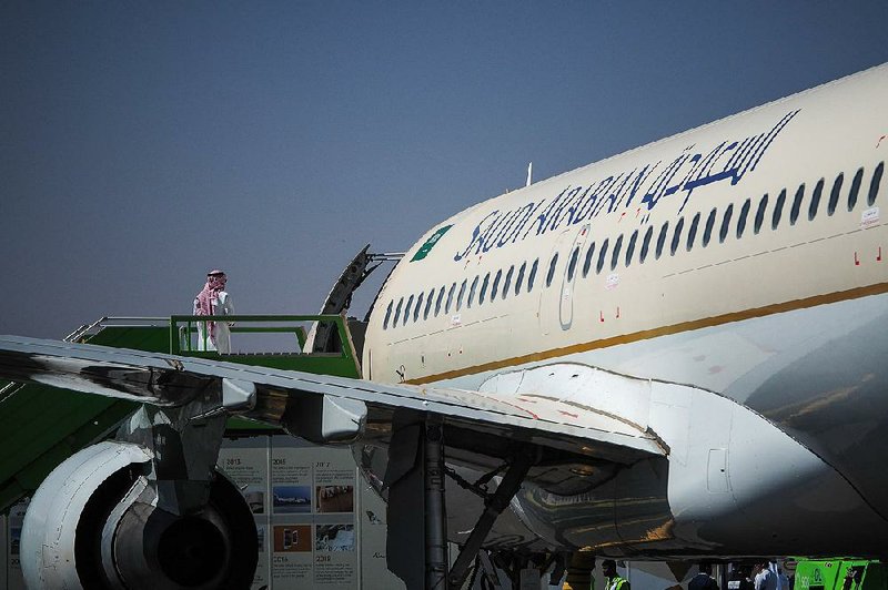China and France signed a $35 billion deal Monday for Beijing to buy 300 Airbus airliners, like this A320 shown recently at the Saudi Air Show in Riyadh, Saudi Arabia 