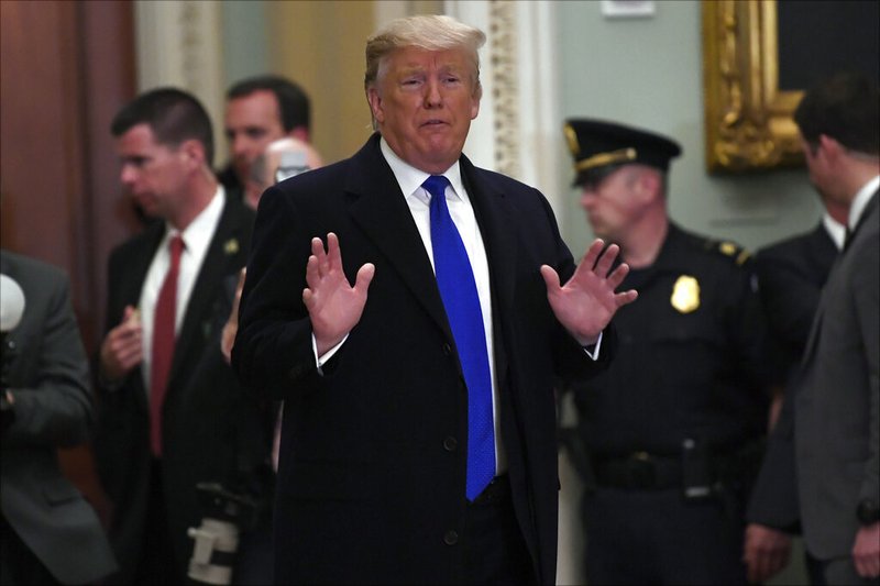 President Trump leaves after attending the weekly Republican policy luncheon on Capitol Hill in Washington, Tuesday, March 26, 2019. (AP Photo/Susan Walsh)