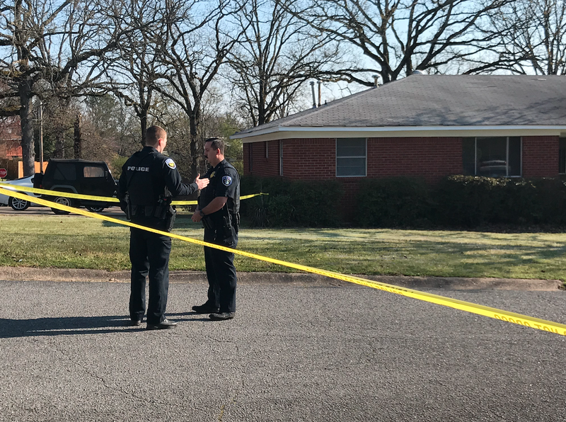 Officers investigate a police shooting in North Little Rock.