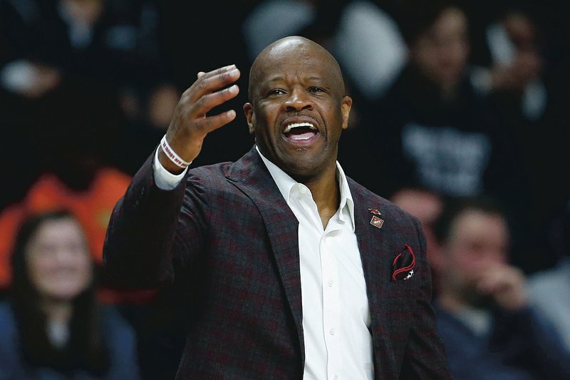 Arkansas head coach Mike Anderson reacts during the second half of a first round NCAA National Invitation Tournament college basketball game against Providence in Providence, R.I., Tuesday, March 19, 2019. (AP Photo/Michael Dwyer)