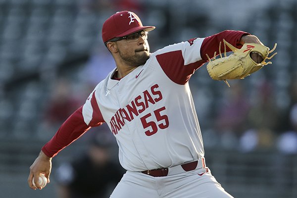 Arkansas pitcher Isaiah Campbell (55) delivers against Alabama during an NCAA college baseball game in Tuscaloosa, Ala., Friday, March 22, 2019. (Gary Cosby Jr./The Tuscaloosa News via AP)