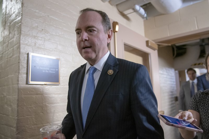House Intelligence Committee Chairman Adam Schiff, D-Calif., arrives for a Democratic Caucus meeting at the Capitol in Washington, Tuesday, March 26, 2019. Schiff, the focus of Republicans' post-Mueller ire, says Mueller's conclusion would not affect his own committee's counterintelligence probes. (AP Photo/J. Scott Applewhite)

