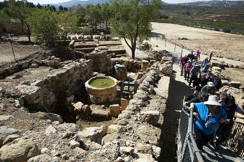 Visitors tour the archaeological site of Tel Shiloh in the West Bank, a biblical tourist attraction that is drawing tens of thousands of evangelical Christian visitors each year. 