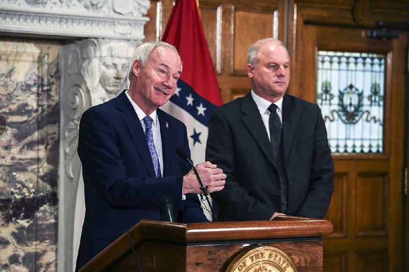 Gov. Asa Hutchinson, with Senate President Pro Tempore Jim Hendren, said Thursday that he expected a federal appeal to move quickly. More photos are available at arkansasonline.com/329genassembly/.