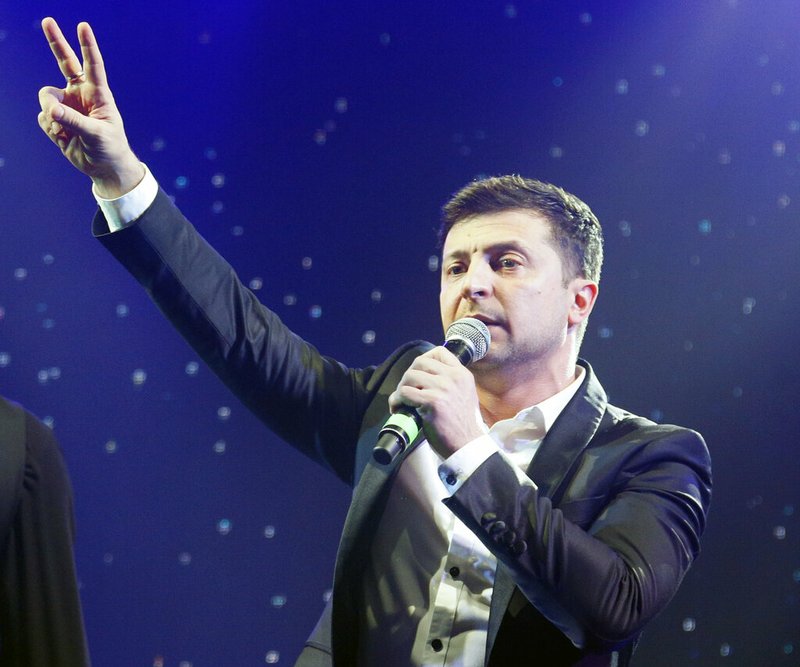 Volodymyr Zelenskiy, Ukrainian actor and candidate in the upcoming presidential election, hosts a comedy show at a concert hall in Brovary, Ukraine, Friday, March 29, 2019. Zelenskiy now surging ahead of both Tymoshenko and Poroshenko in the presidential context according to polls. (AP Photo/Efrem Lukatsky)