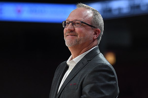 Arkansas coach Mike Neighbors smiles during a WNIT third round game Thursday, March 28, 2019, in Fayetteville.