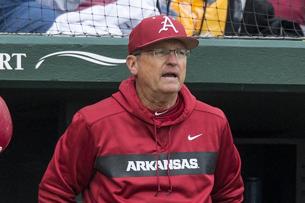 Dave Van Horn, Arkansas head coach, reacts after a double by Jacob Nesbit in the second inning Saturday, March 30, 2019, during the game vs Ole Miss at Baum-Walker Stadium in Fayetteville.