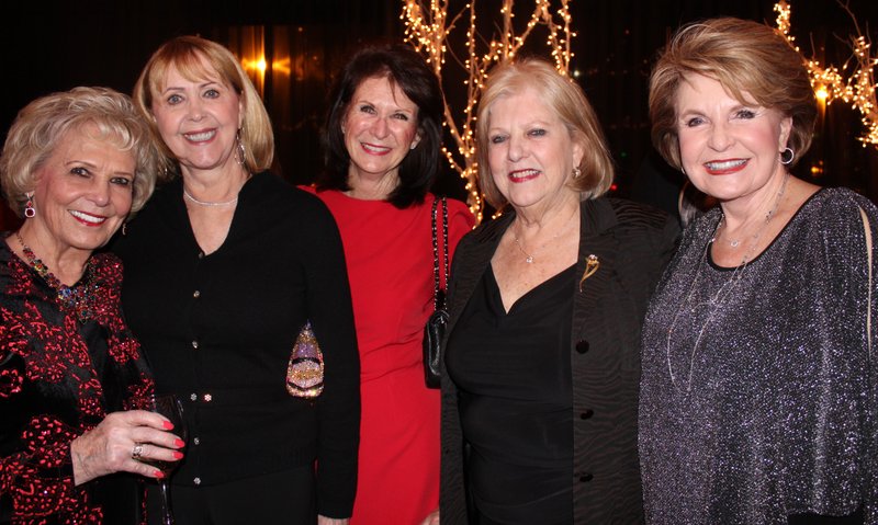 NWA Democrat-Gazette/CARIN SCHOPPMEYER Carol Clifford (from left), Debbie Evans, Cynthia Coughlin, Terrye Brosh and Mary Storey gather at the Symphony of Northwest Arkansas Spring Gala on March 5 at Mermaids Seafood Restaurant in Fayetteville.