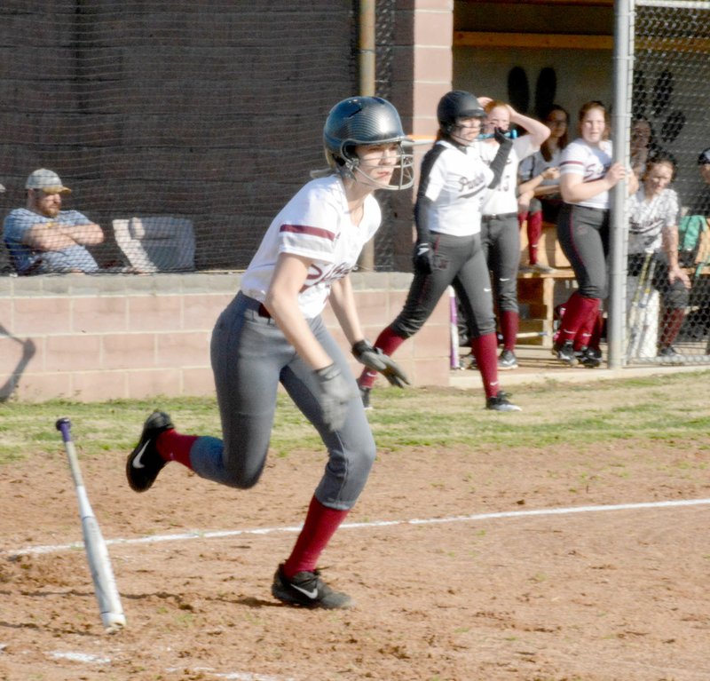 Graham Thomas/Siloam Sunday Siloam Springs senior Aislyn Burchette runs to first during game one Tuesday in a softball doubleheader against Alma.