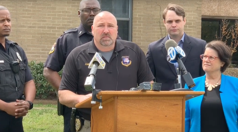 Prescott Police Department Chief Joseph Beavers (center) speaks Monday in front of Prescott High School after a 14-year-old shot another eighth-grader on campus that morning.