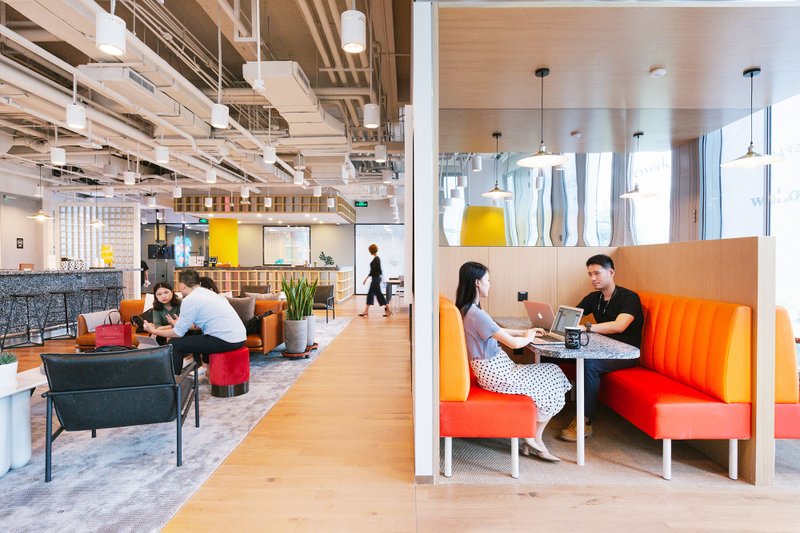 Photo Courtesy/NICK TORTAJADA Stock image of WeWork common area.