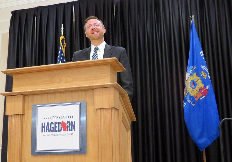 Wisconsin Supreme Court candidate Brian Hagedorn speaks at a news conference Wednesday, April 3, 2019, in Pewaukee, Wis. (AP Photo/Ivan Moreno)