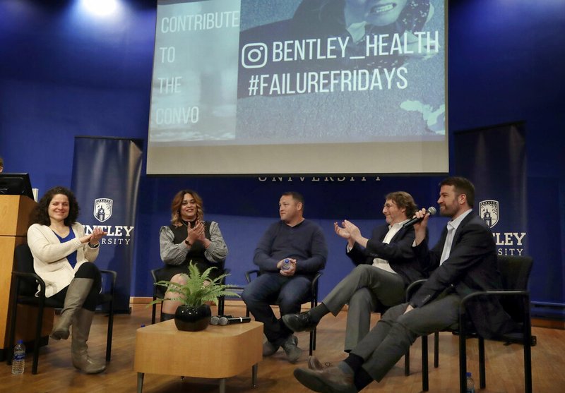 In this March 5, 2019 photo, panel members, from left, Angela Giordano, Natalie Baucum, Mike Duggan, Fred Ledley and school counselor Peter Forkner participate in an event at Bentley University, in Waltham, Mass., where professors and alumni shared some of their worst setbacks to illustrate that even successful people sometimes fail. A growing number of U.S. colleges are trying to "normalize" failure for a generation of students who increasingly struggle with stress, anxiety and the ability to bounce back from adversity. (AP Photo/Elise Amendola)